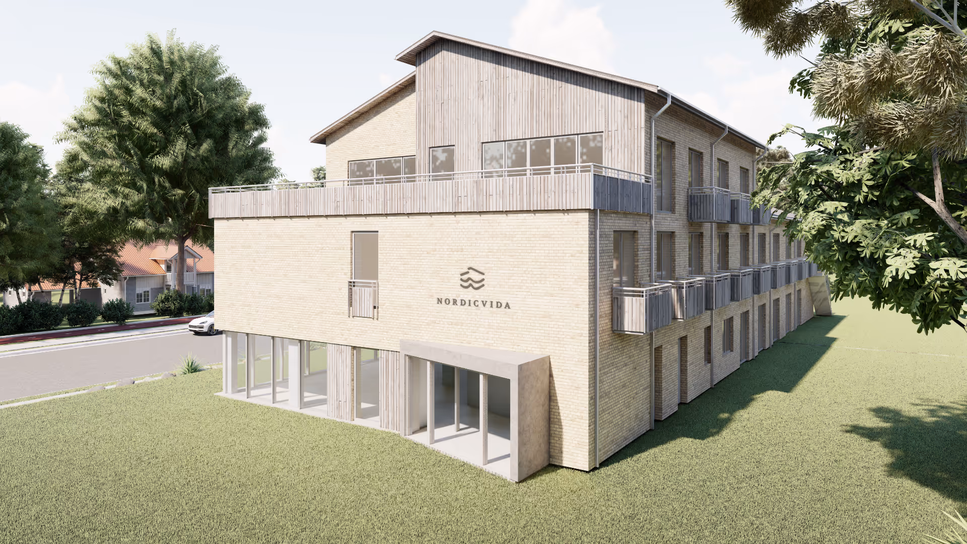Unveränderte Außenansicht des Nordic Vida Hotels mit heller Fassade und Holzverkleidung